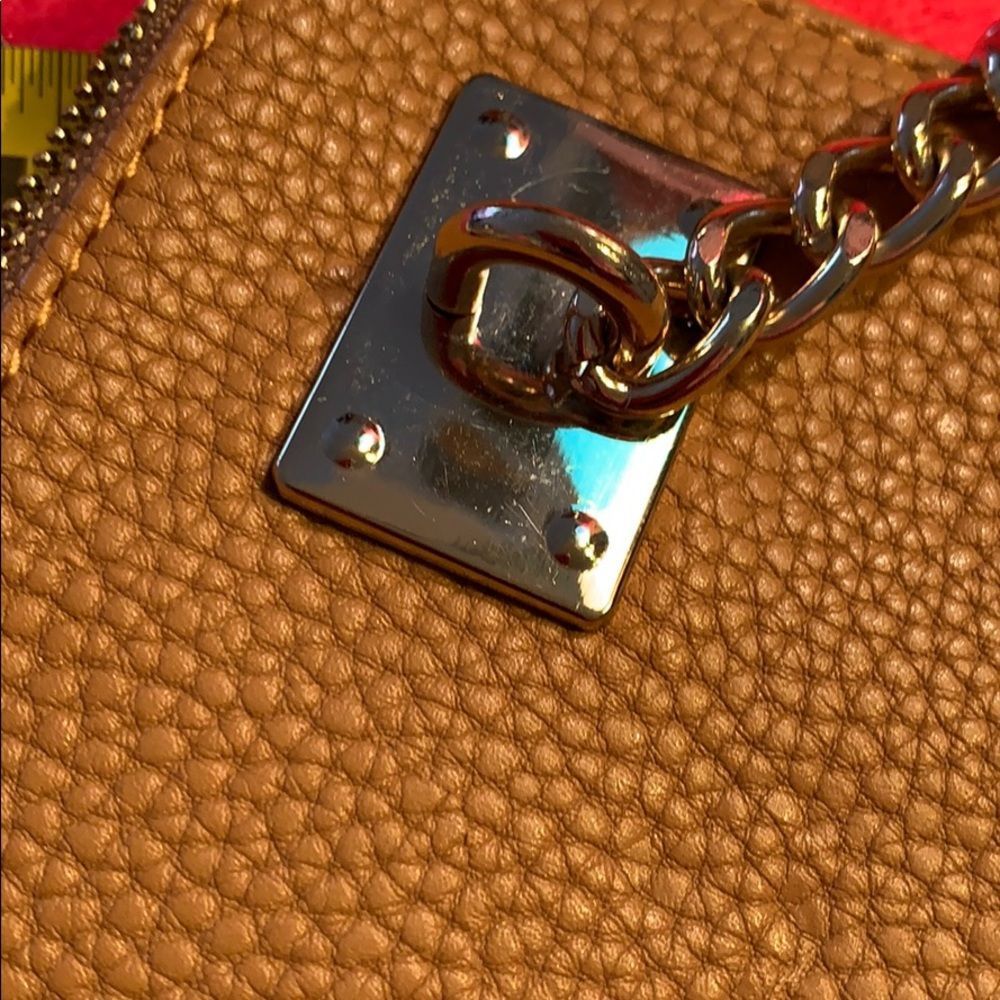 Flat tan clutch